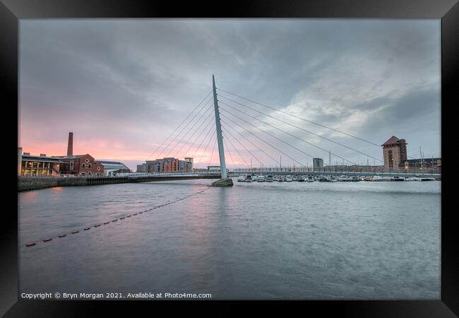 Swansea marina sail bridge at sunrise Framed Print by Bryn Morgan