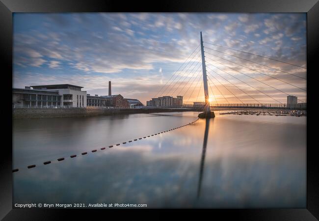 Swansea marina sail bridge at sunrise Framed Print by Bryn Morgan