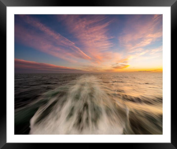 Sunset behind a cruising cruise ship at sea Framed Mounted Print by Steve Heap