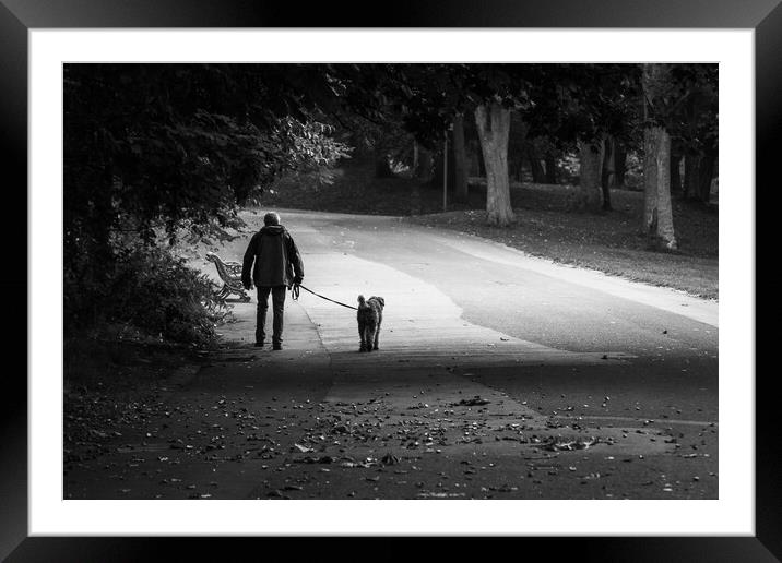 Walking the dog Framed Mounted Print by Jason Wells