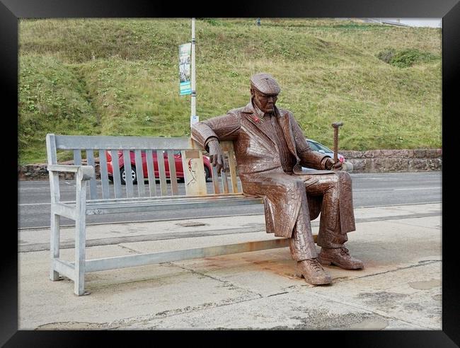 Sculpture of Freddie Gilroy on bench Scarborough Framed Print by Roy Hinchliffe