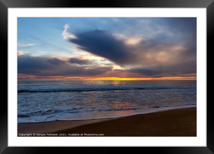 View of a sunset over a sea. Framed Mounted Print by Sergey Fedoskin