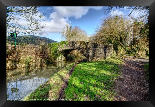 The Neath Canal in winter Framed Print by Peter Thomas