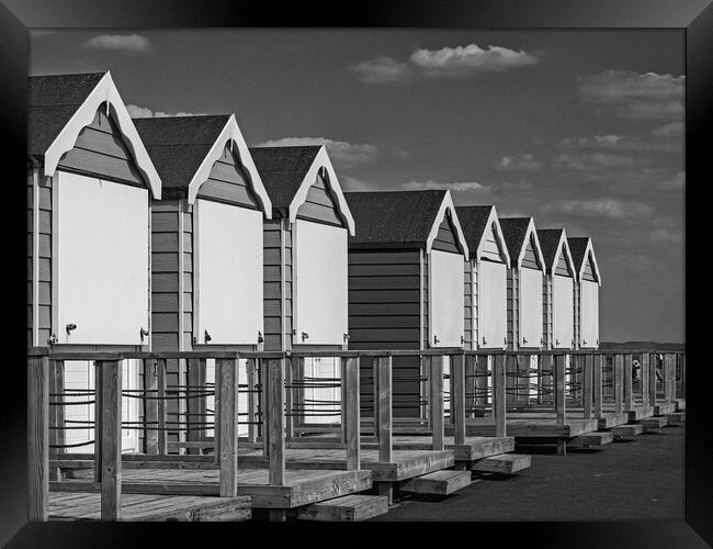 Closed beach huts at Lytham St Annes  Framed Print by Vicky Outen
