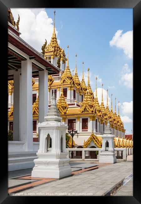 spires of Wat Ratchanadda Framed Print by Kevin Hellon