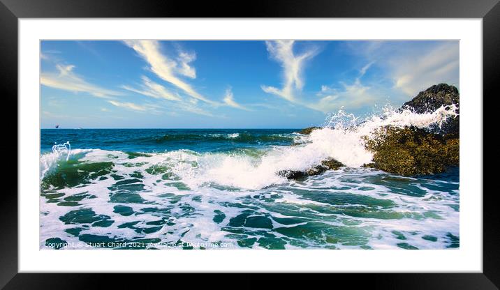 Waves crashing over the rocks with surf and spray Framed Mounted Print by Stuart Chard