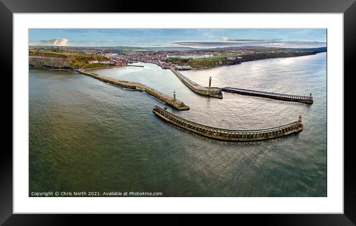 Whitby harbour approaches and village. Framed Mounted Print by Chris North