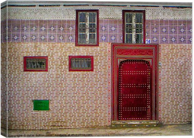 A tiled frontage to a residence in Tetoun town, Morocco. Canvas Print by Peter Bolton
