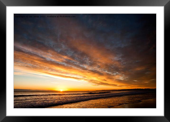 Morning sun sitting on the horizon Framed Mounted Print by Jim Jones