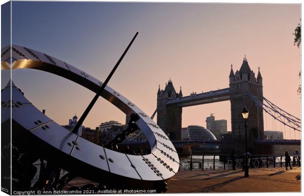 London bridge and sundial Canvas Print by Ann Biddlecombe