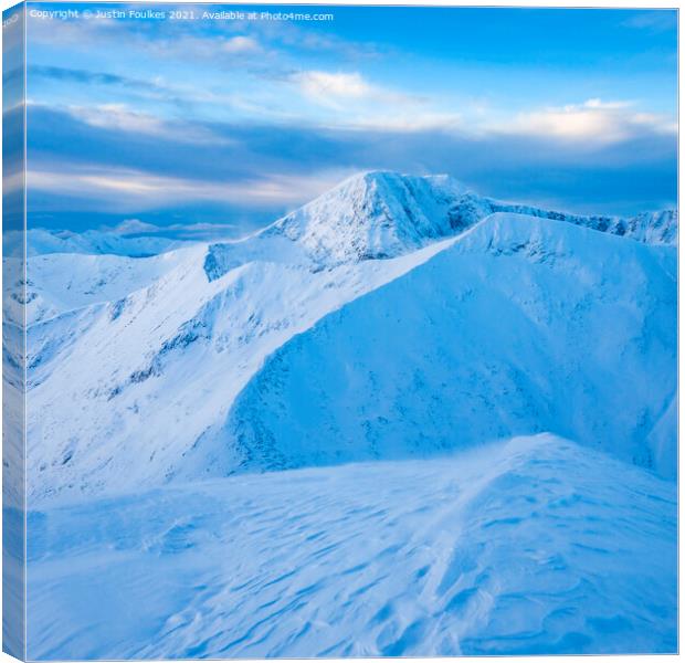 Winter view of Ben Nevis and Carn Mor Dearg from A Canvas Print by Justin Foulkes