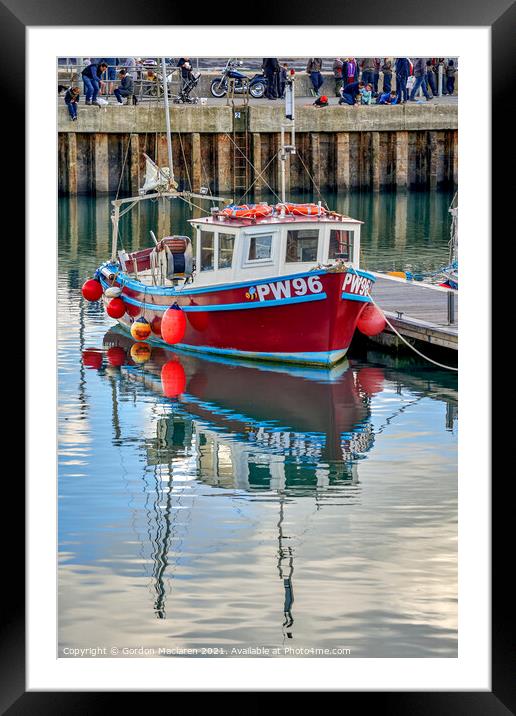 A fishing boat moored in Padstow Harbour  Framed Mounted Print by Gordon Maclaren