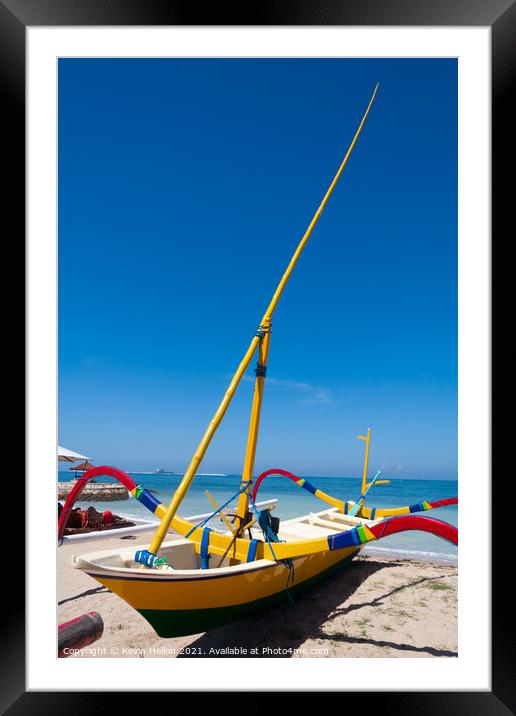 Traditional jukung boat on the beach in Sanur, Bali, Indonesia Framed Mounted Print by Kevin Hellon