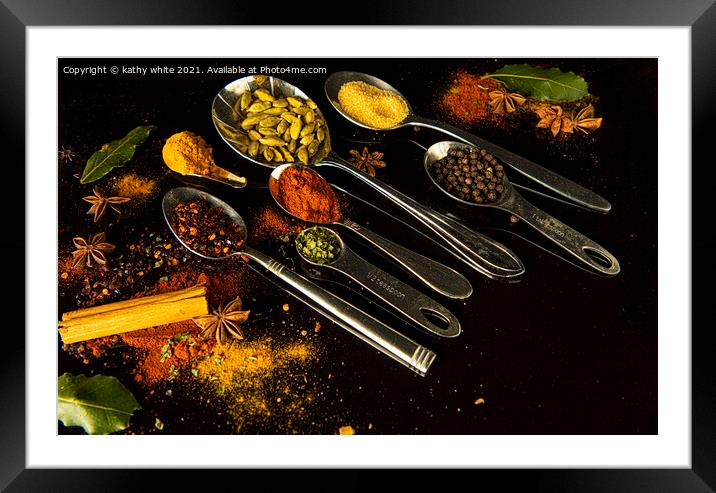 curry spice on a black background Framed Mounted Print by kathy white