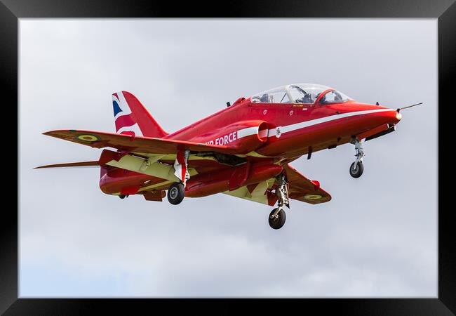 Red Arrow descends into Liverpool airport Framed Print by Jason Wells