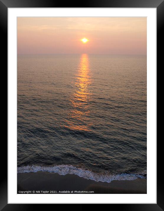 Sunset over the sea Framed Mounted Print by Nik Taylor