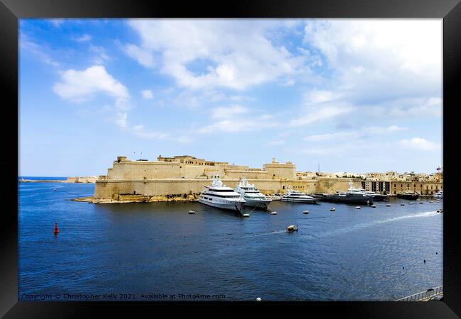 Senglea with a view to valletta Framed Print by Christopher Kelly