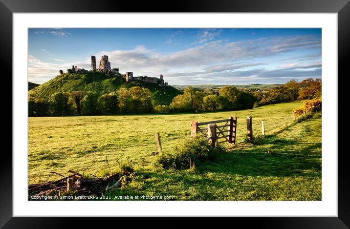 Corfe Castle ruin in Dorset England with gate Framed Mounted Print by Simon Bratt LRPS