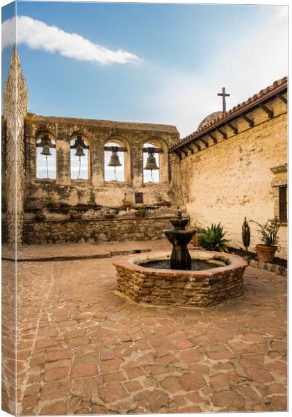 Bell tower in San Juan Capistrano mission Canvas Print by Steve Heap