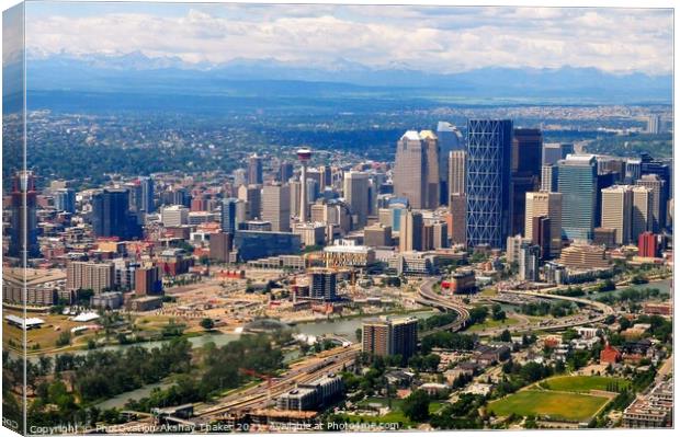 Aerial view of city of Calgary with Rocky Mountains in the background. Canvas Print by PhotOvation-Akshay Thaker