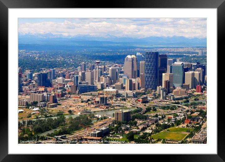 Aerial view of city of Calgary with Rocky Mountains in the background. Framed Mounted Print by PhotOvation-Akshay Thaker
