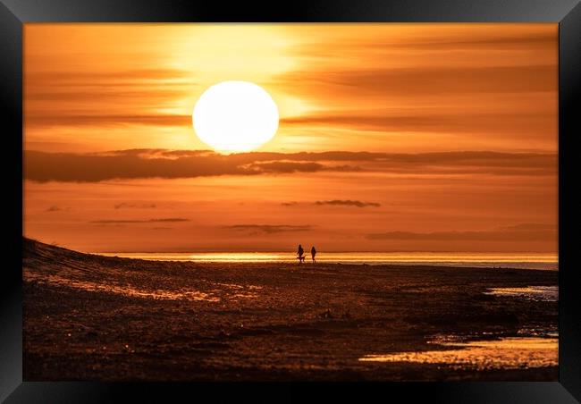 A sunset stroll on Holme beach  Framed Print by Gary Pearson