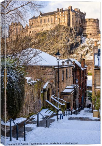 Edinburgh Castle from The Vennel with snowman Canvas Print by Angus McComiskey
