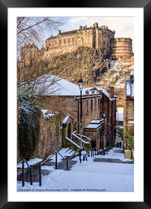 Edinburgh Castle from The Vennel with snowman Framed Mounted Print by Angus McComiskey