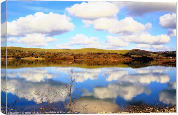 Countryside water reflections. Canvas Print by john hill