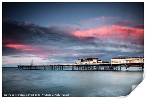 Sunset over Colwyn Bay Pier, North Wales Print by Christine Smart