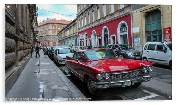 Vintage red cadillac deville car parked in a Budapest street in the evening Acrylic by SnapT Photography