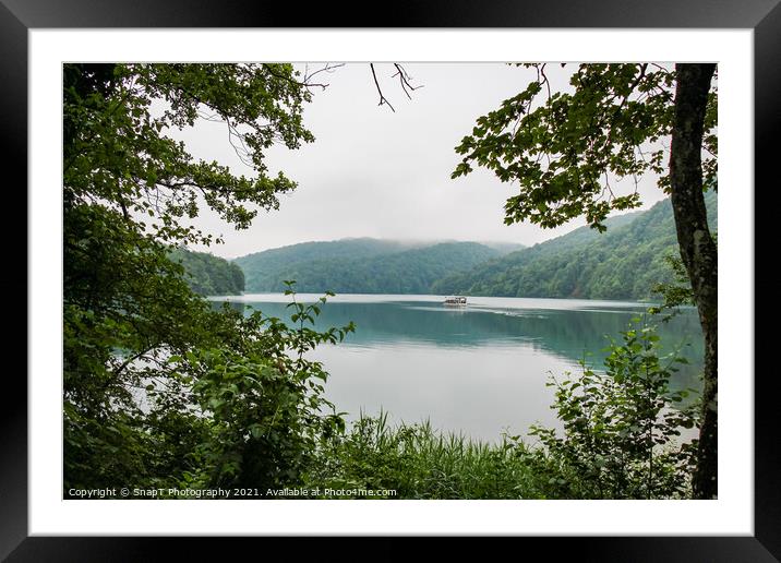 A view across Lake Kozjak with a boat in the background, Plitvice Lakes, Croatia Framed Mounted Print by SnapT Photography