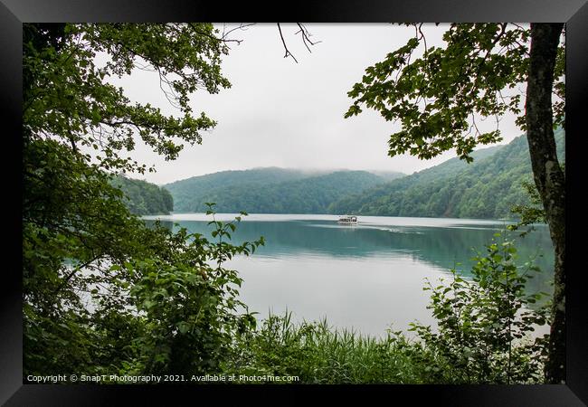 A view across Lake Kozjak with a boat in the background, Plitvice Lakes, Croatia Framed Print by SnapT Photography