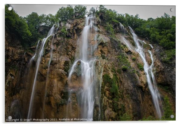 A long exposure of a large waterfall flowing at Plitvice Lakes, Croatia Acrylic by SnapT Photography