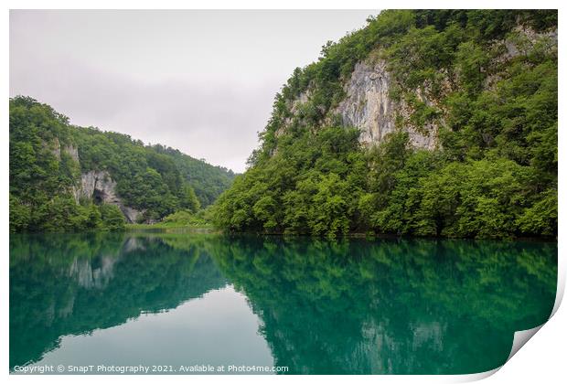 A reflection of a mountain valley on a lake at Plitvice Lakes, Croatia Print by SnapT Photography