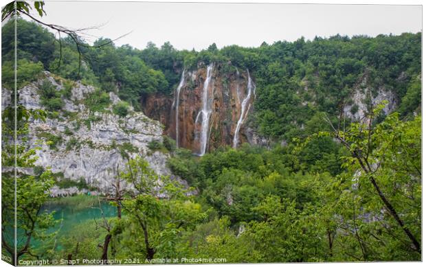 A large waterfall at a lake at Plitvice Lakes, UNESCO World Heritage Site, Canvas Print by SnapT Photography