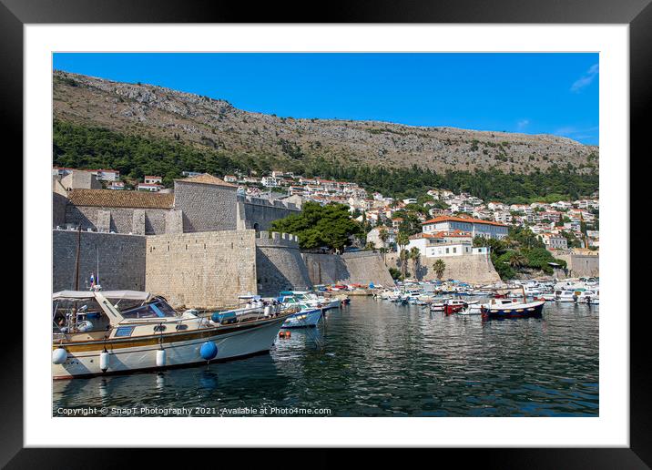 Boats moored in Dubrovnik Harbour by the city walls of the old town, Croatia Framed Mounted Print by SnapT Photography
