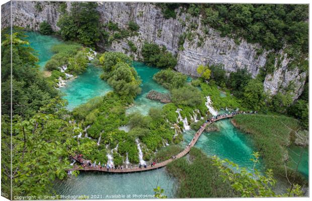A series of waterfalls and tourists at Plitvice Lakes, Croatia Canvas Print by SnapT Photography