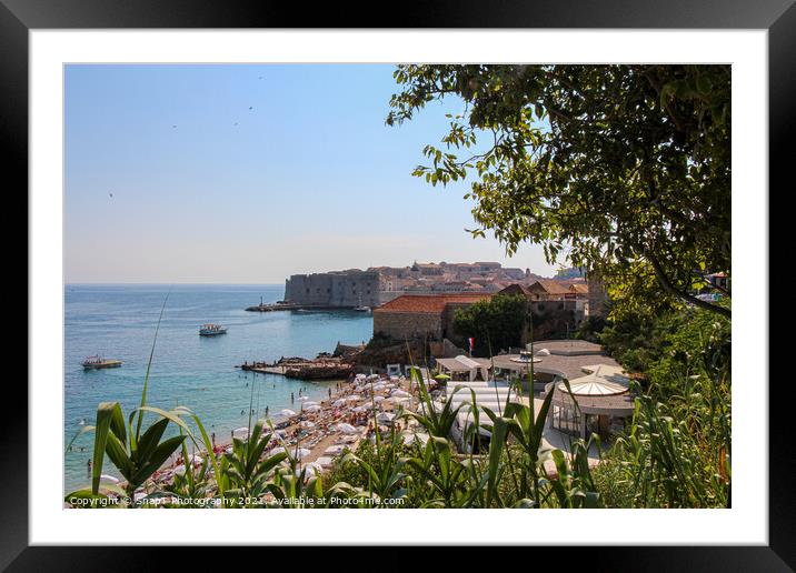 A crowded Plaza Banje Beach in Dubrovnik, with the old town in the background Framed Mounted Print by SnapT Photography
