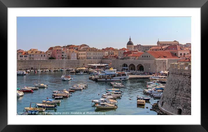 A view over the old harbour and town with boats and yachts moored, Dubrovnik Framed Mounted Print by SnapT Photography
