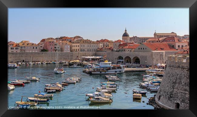 A view over the old harbour and town with boats and yachts moored, Dubrovnik Framed Print by SnapT Photography