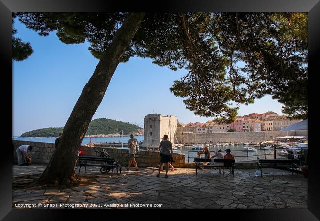 Tourists viewing the harbour and old town in Dubrovnik, Croatia Framed Print by SnapT Photography