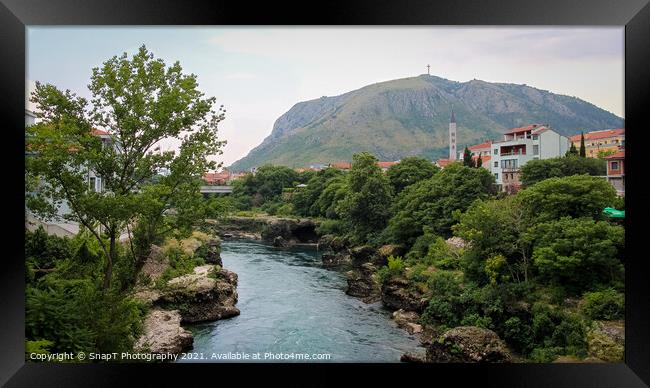 The Neretva River flowing through Mostar, with Hum Hill and Christain Cross Framed Print by SnapT Photography