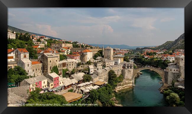 View over the old town of Mostar and the old bridge over the Neretva River Framed Print by SnapT Photography