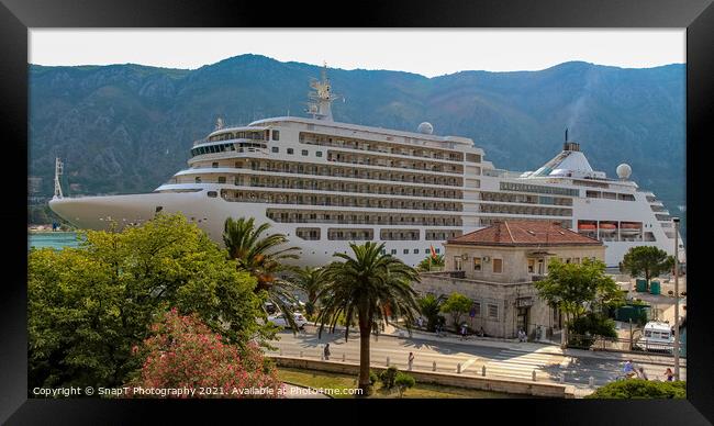 A cruise ship moored at the harbour at the old town in Kotor, Montenegro Framed Print by SnapT Photography