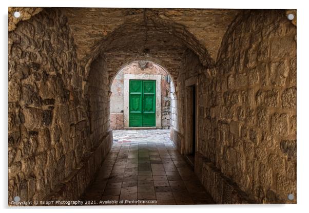 An alleyway in the old town of Kotor, Montenegro, with a green door at the end Acrylic by SnapT Photography