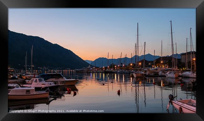 Sunset reflecting over the harbour of the Old Town of Kotor, Montenegro Framed Print by SnapT Photography