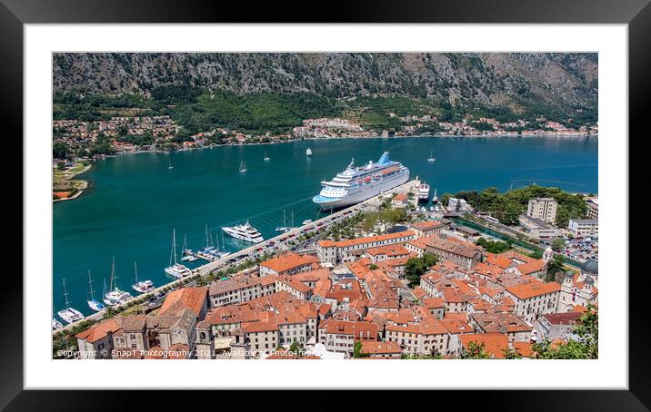 A cruise ship moored at the UNESCO World Heritage Site of the Old Town of Kotor Framed Mounted Print by SnapT Photography