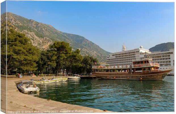 Ferries and cruise ships moored at the harbour in Kotor, Montenegro Canvas Print by SnapT Photography