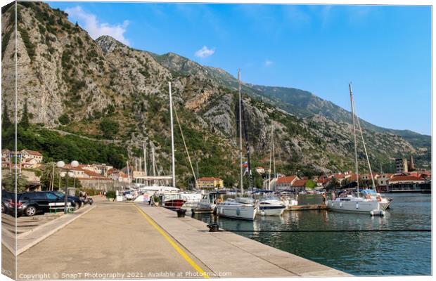 Luxury yachts moored at the harbour in the Old Town of Kotor, Montenegro Canvas Print by SnapT Photography